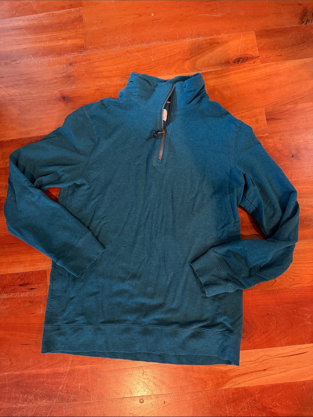 Surfside Supply Co. quarter-zip pullover sweatshirt.